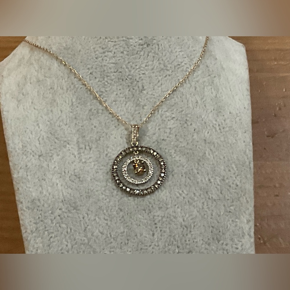 14k gold brown (chocolate) and white diamond 3 circular (halo) pendant on chain.